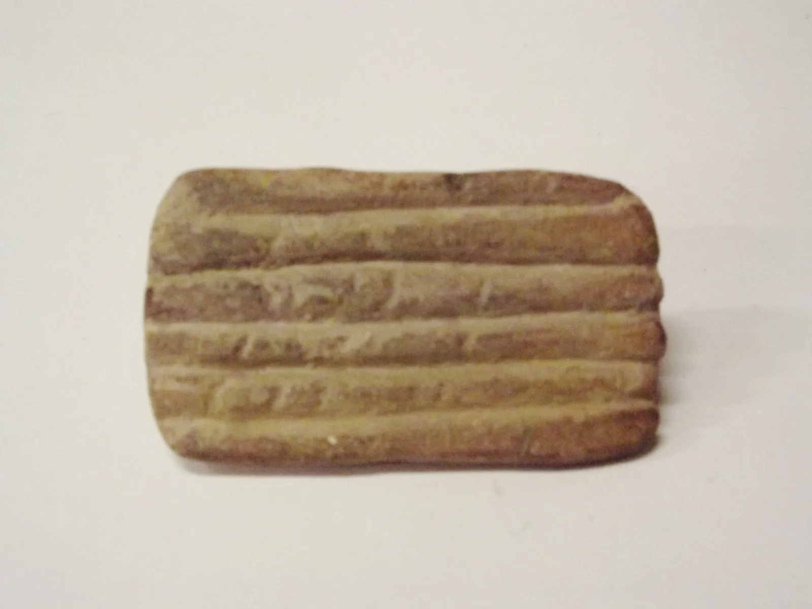 Sello de barro cocido