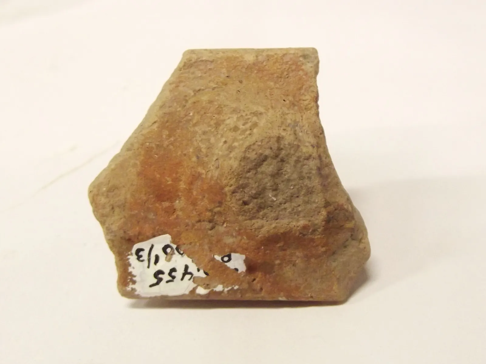 Sello de barro cocido
