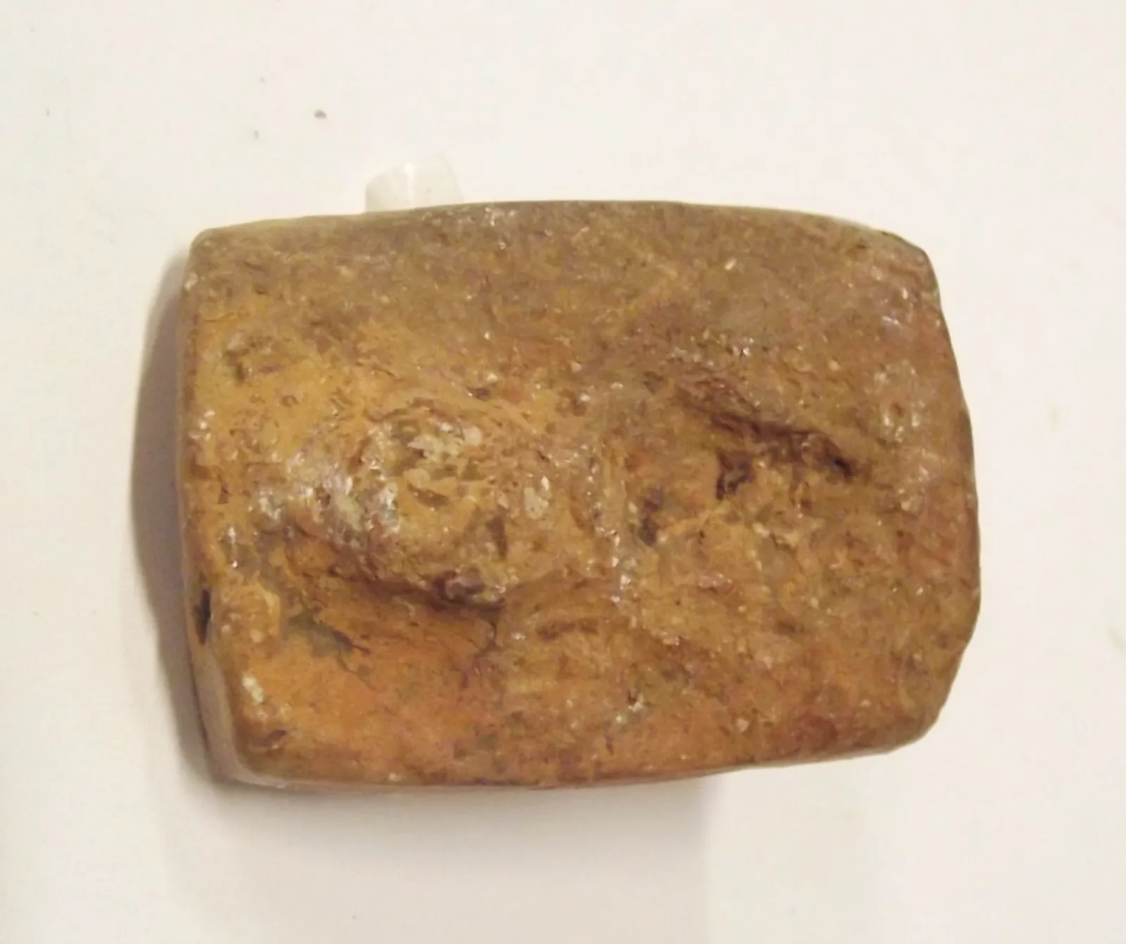 Sello de barro cocido