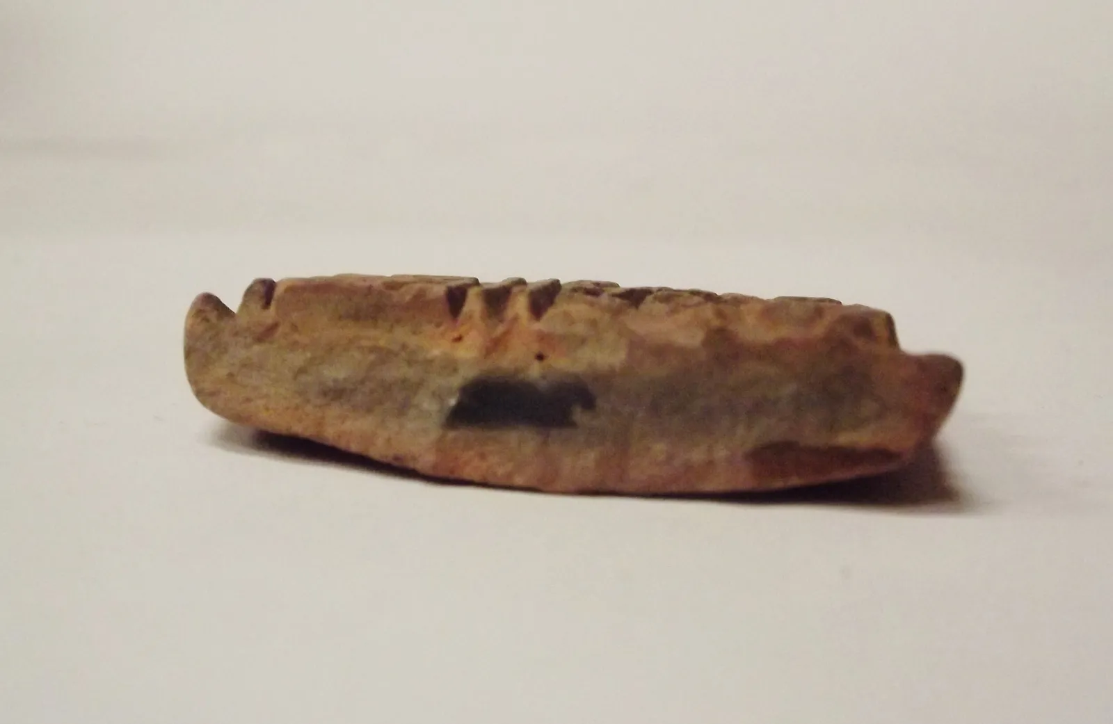 Sello de barro cocido