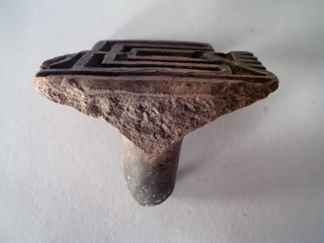 Sello de barro cocido