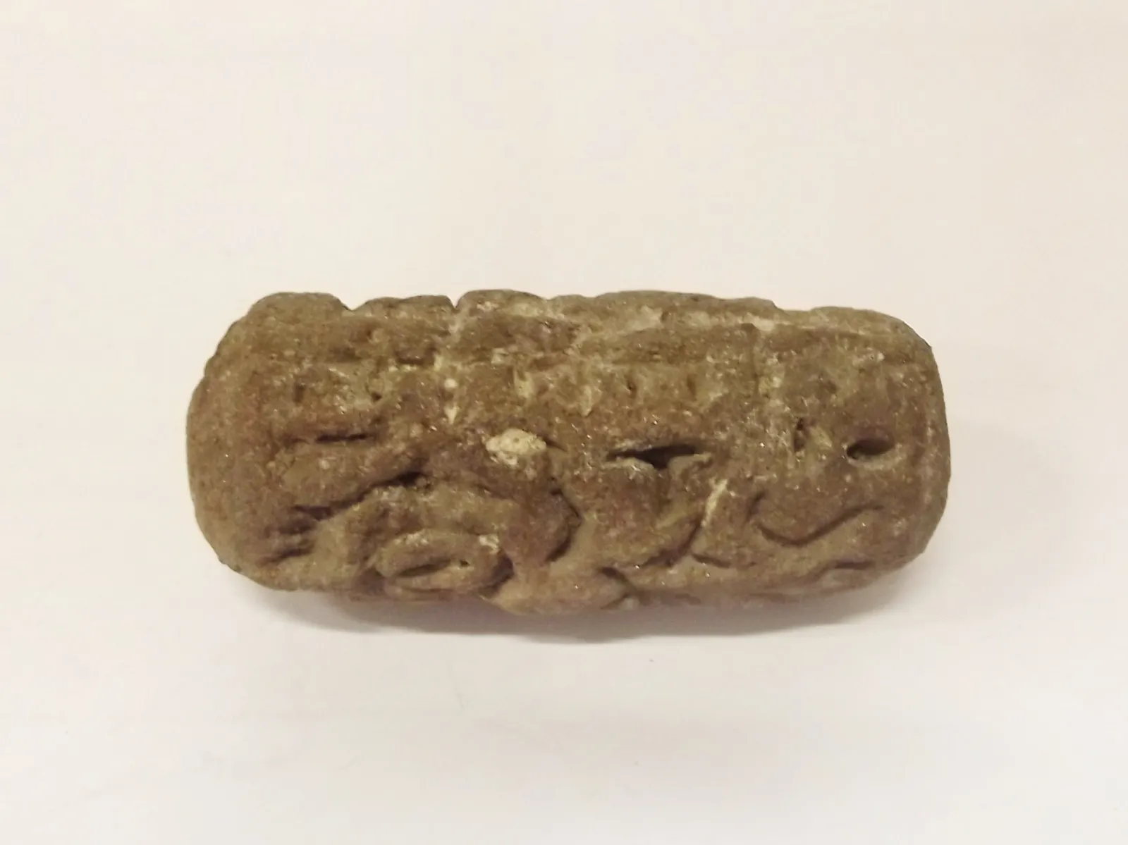 Sello de barro cocido
