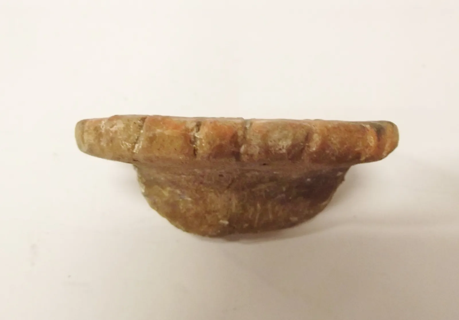 Sello de barro cocido