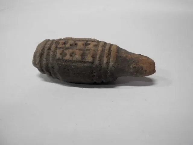 Sello de barro cocido