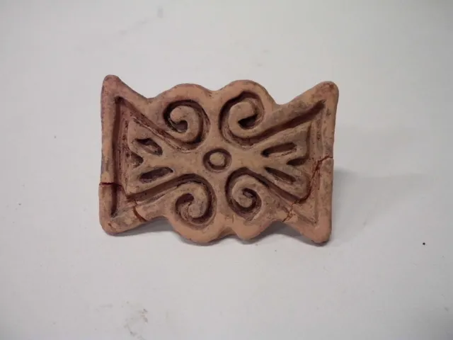 Sello de barro cocido