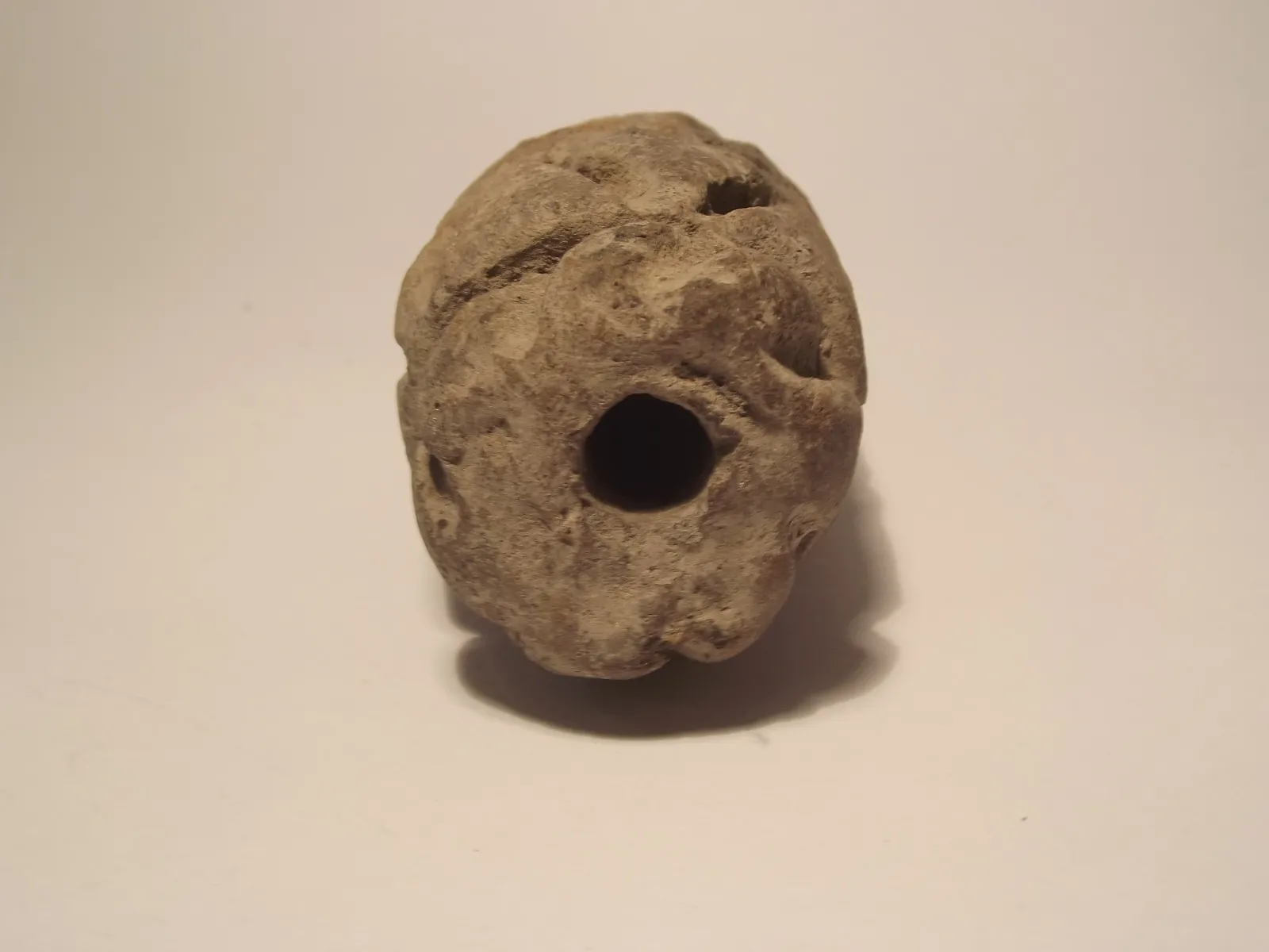 Sello de barro cocido