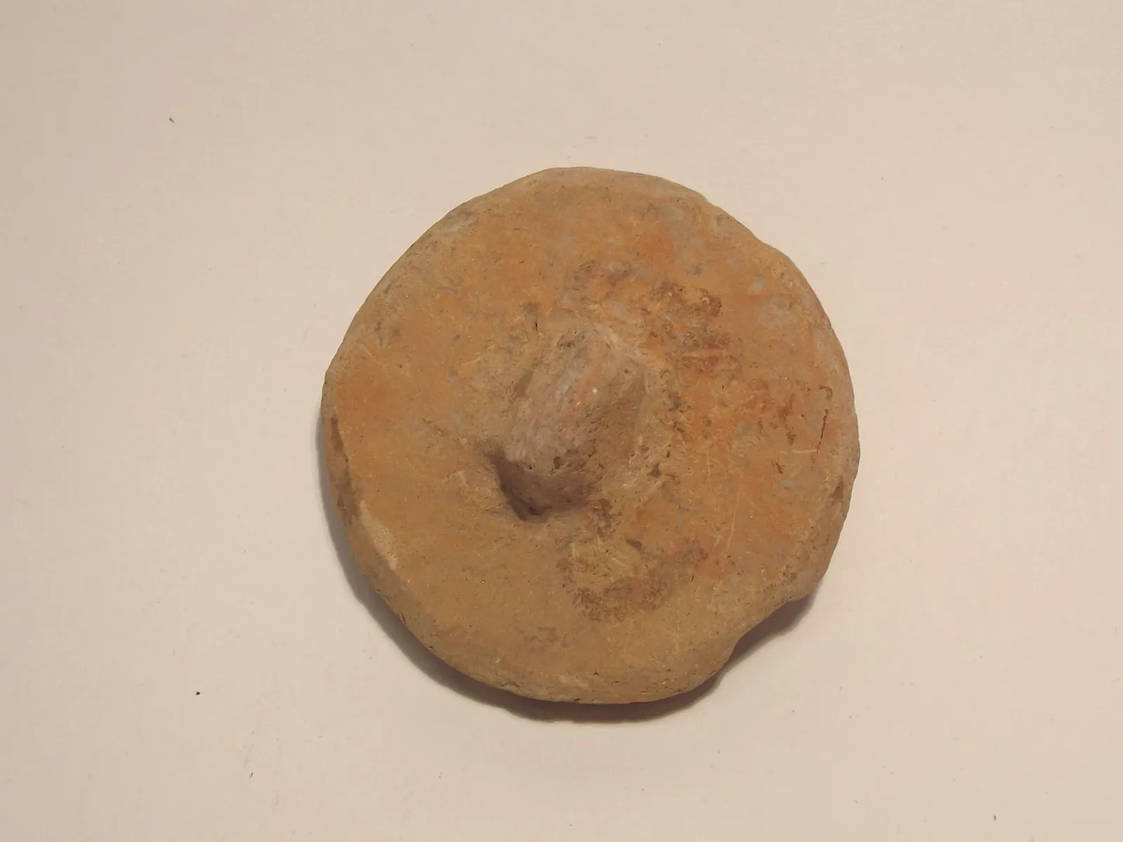 Sello de barro cocido