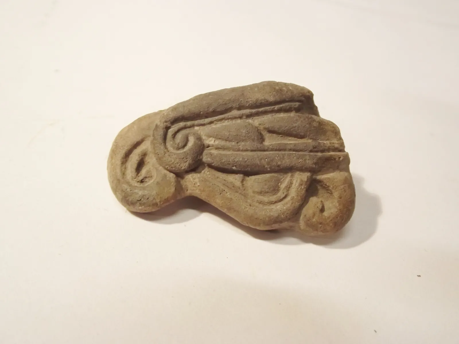 Sello de barro cocido