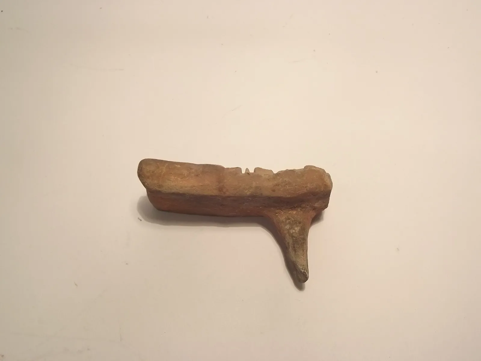 Sello de barro cocido