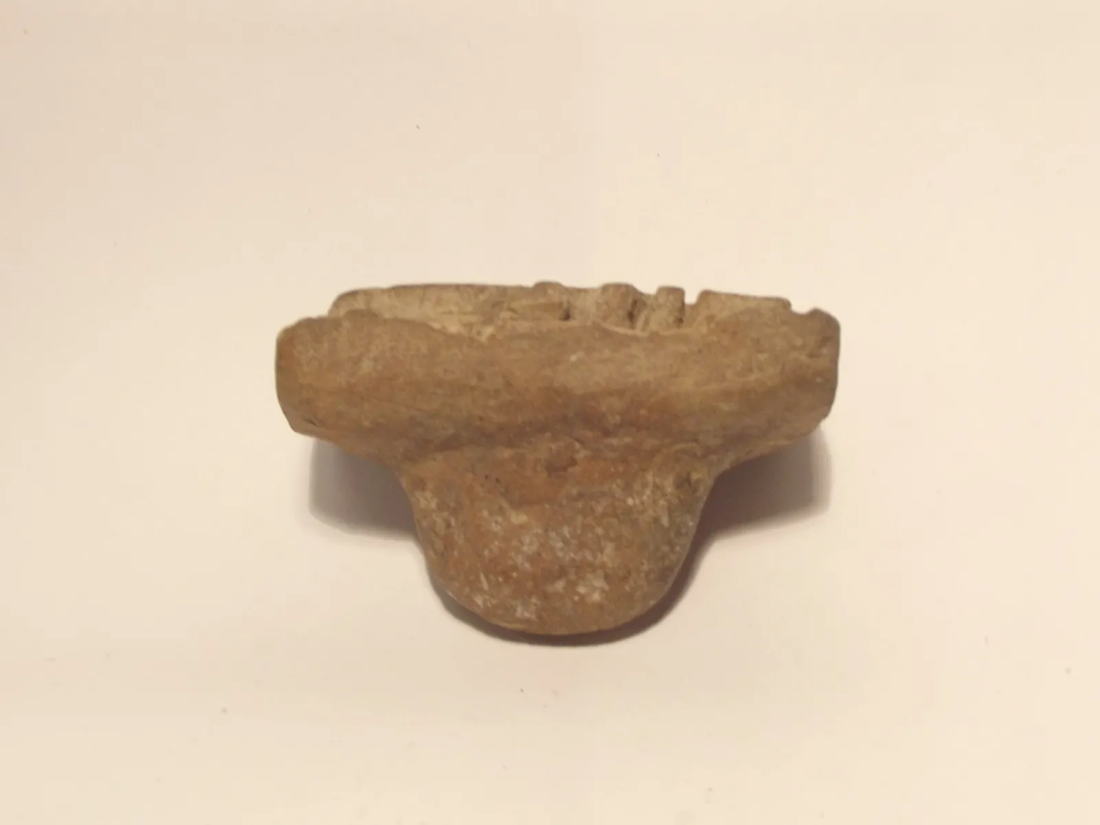 Sello de barro cocido