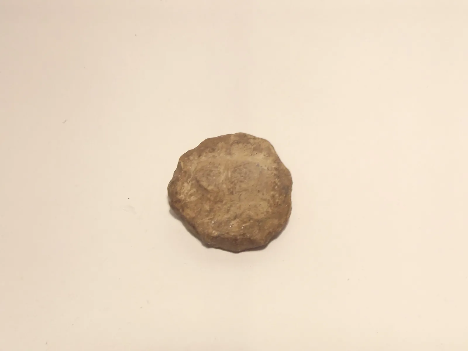 Sello de barro cocido