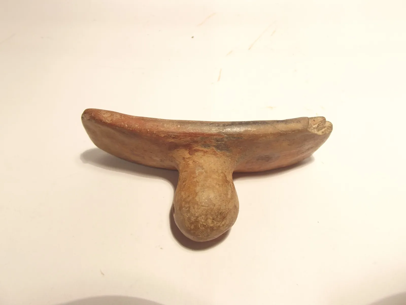 Sello de barro cocido