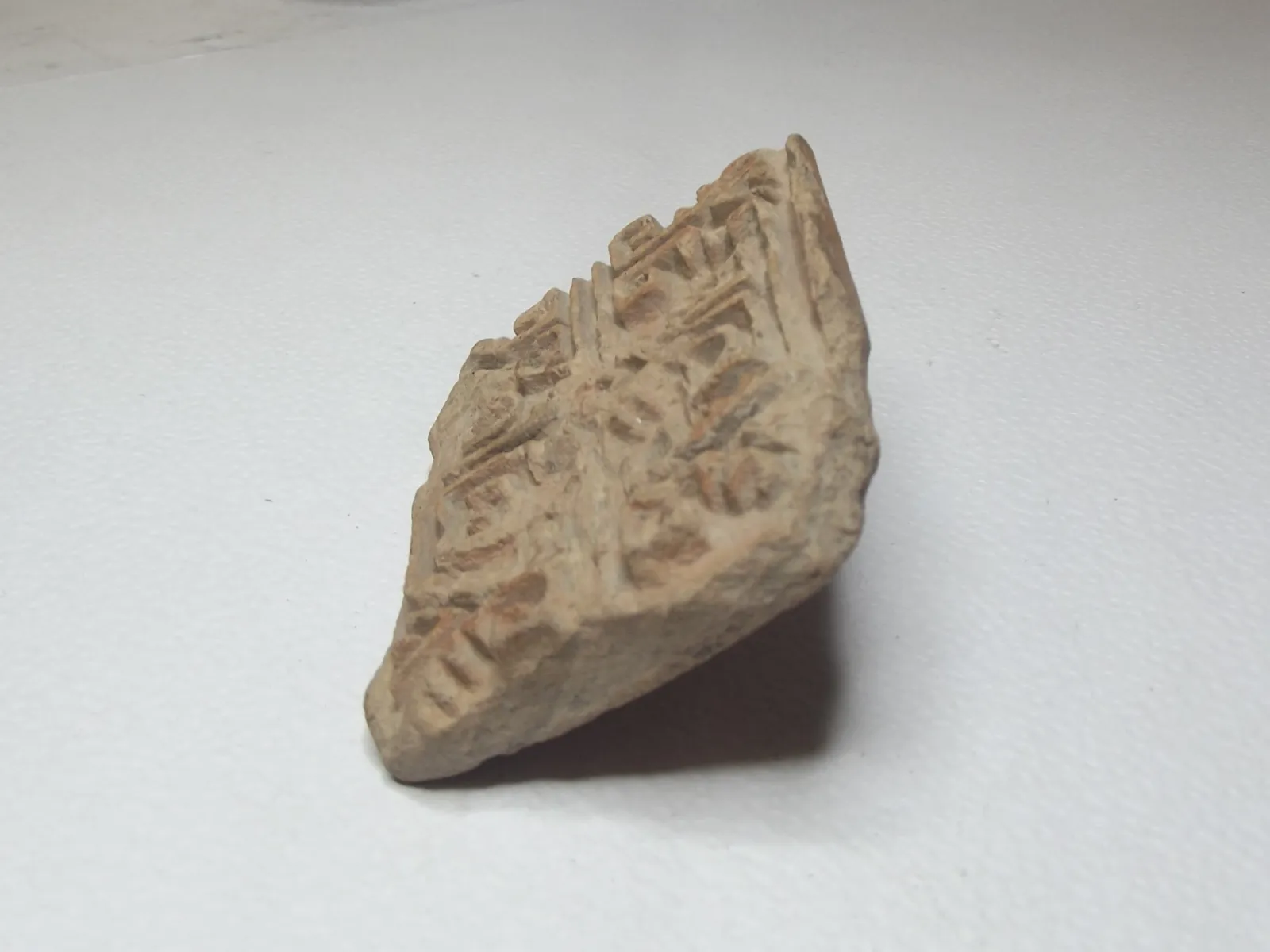 Sello de barro cocido
