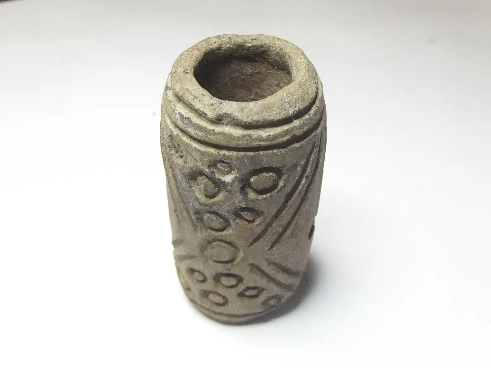 Sello de barro cocido