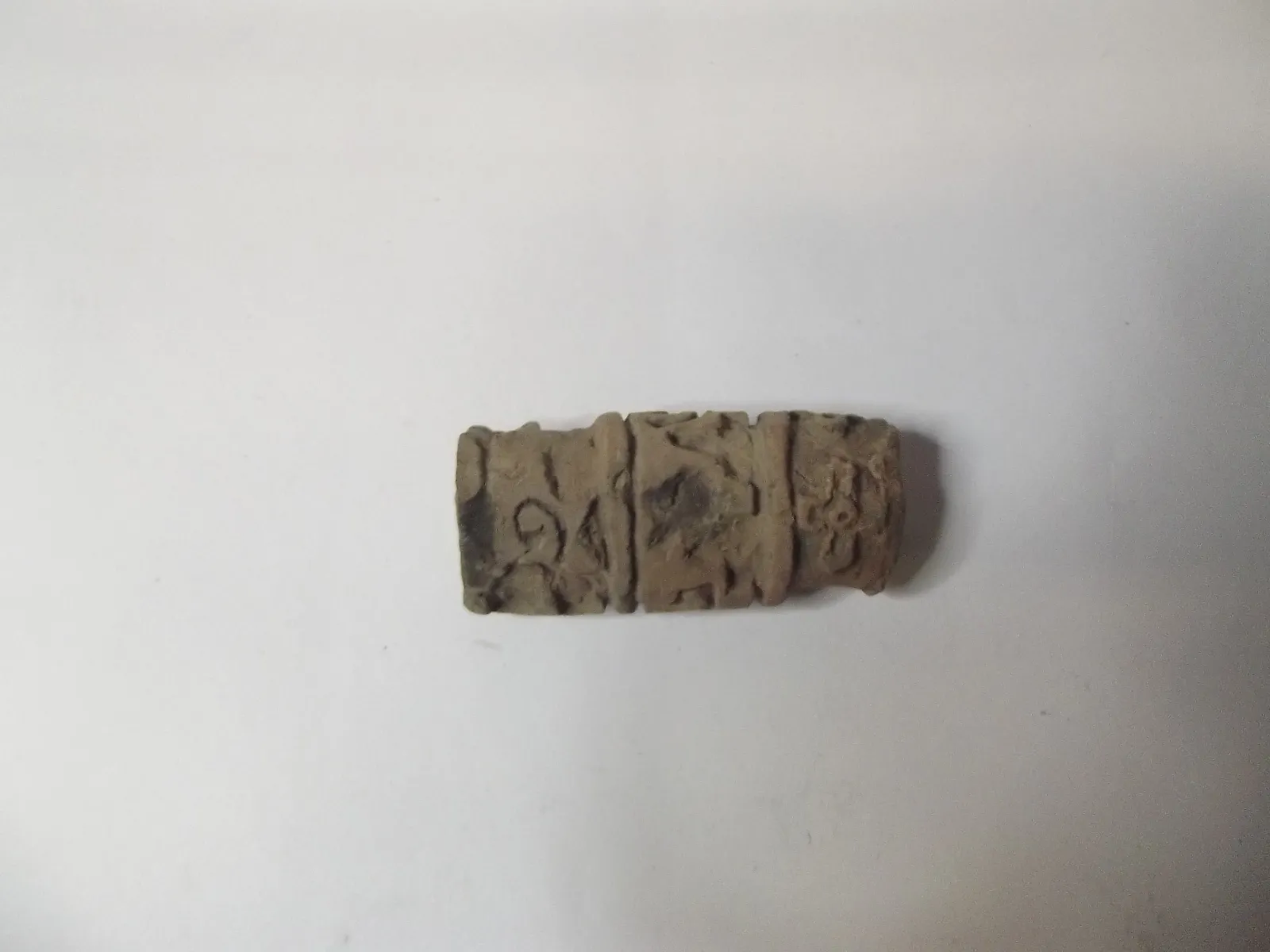 Sello de barro cocido