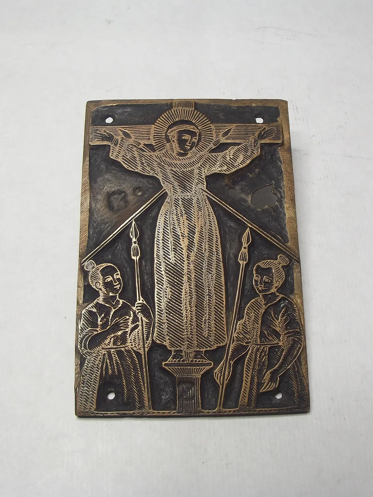 Grabado en bronce