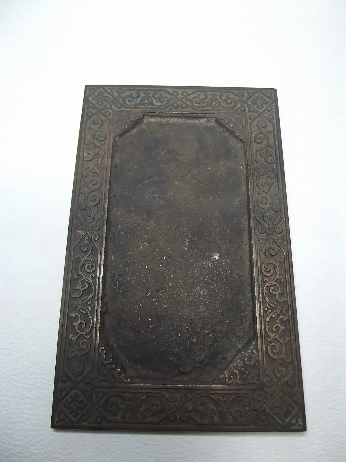 Grabado en bronce