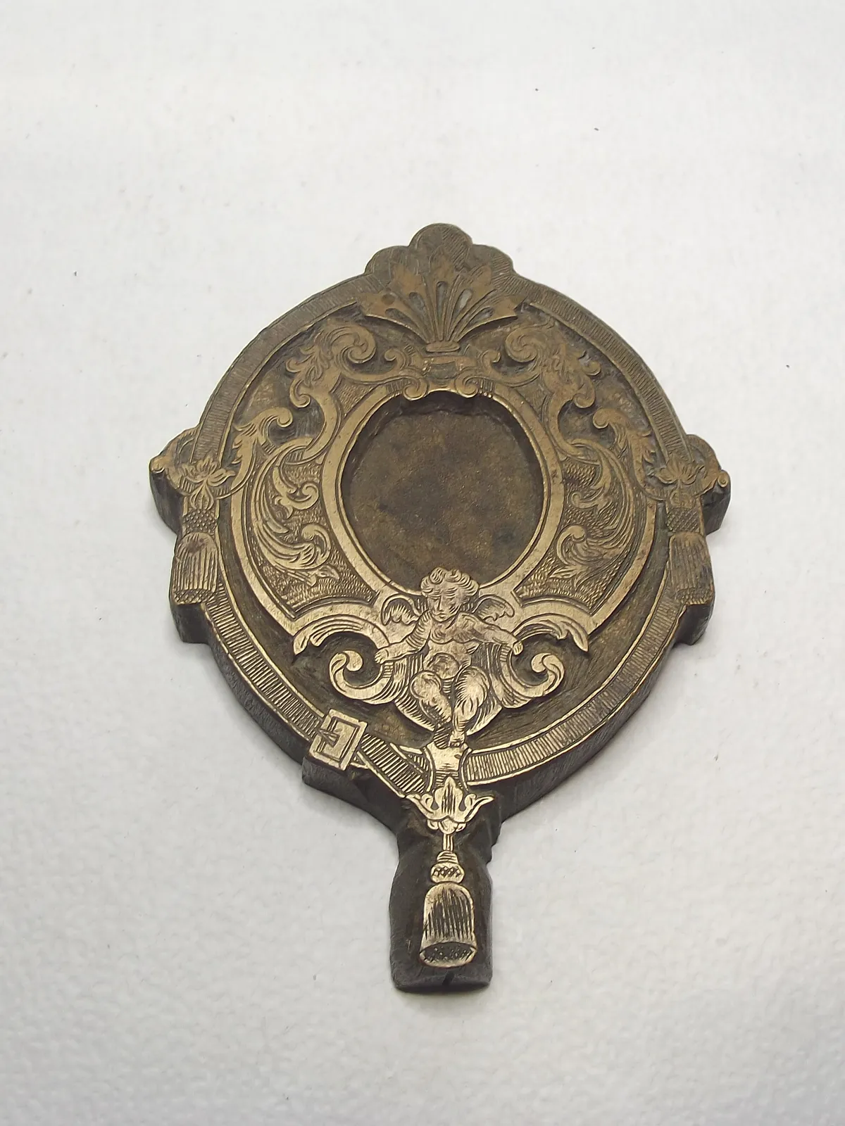 Sello de bronce