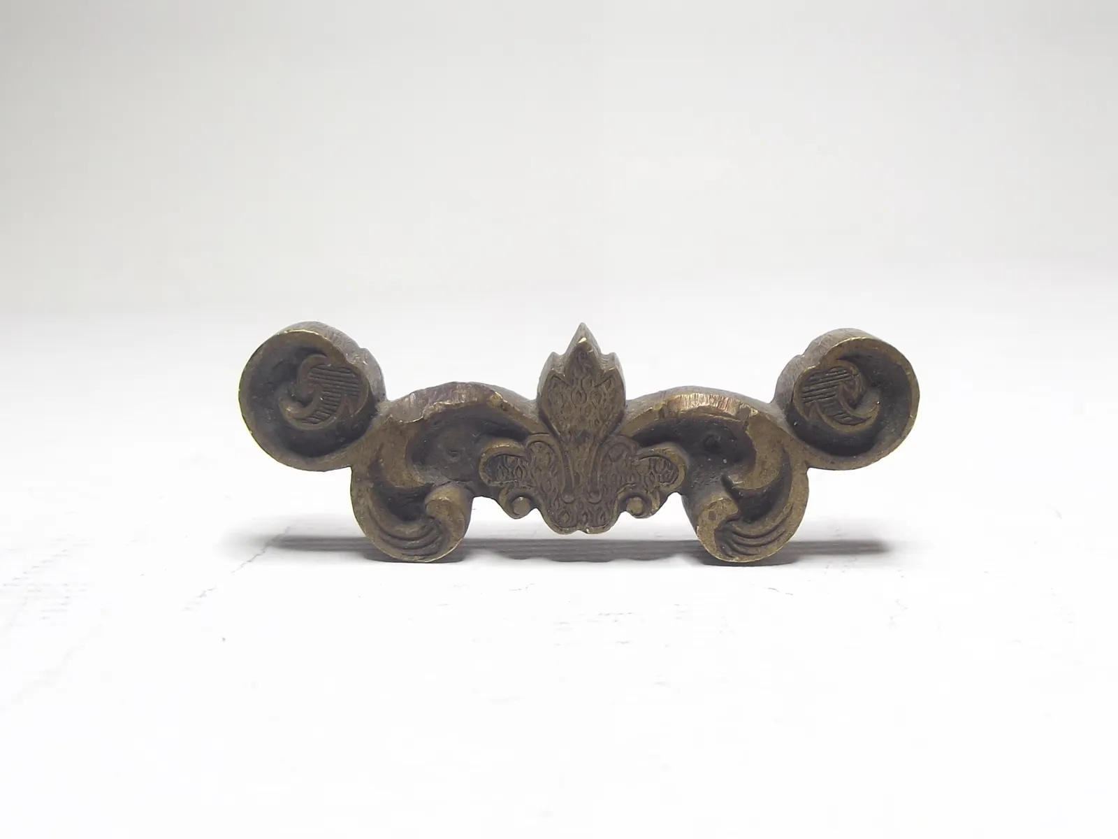 Sello de bronce