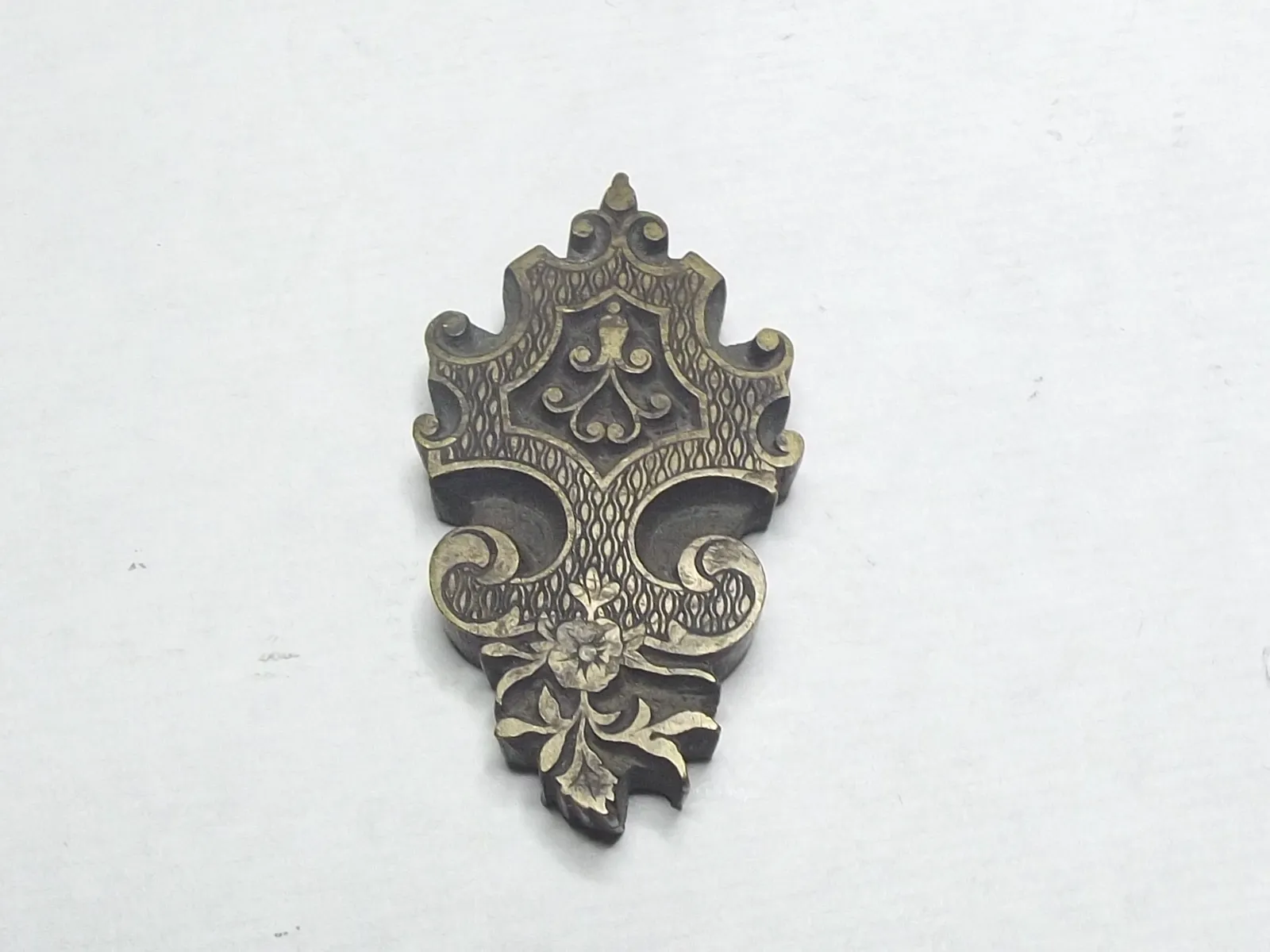 Sello de bronce