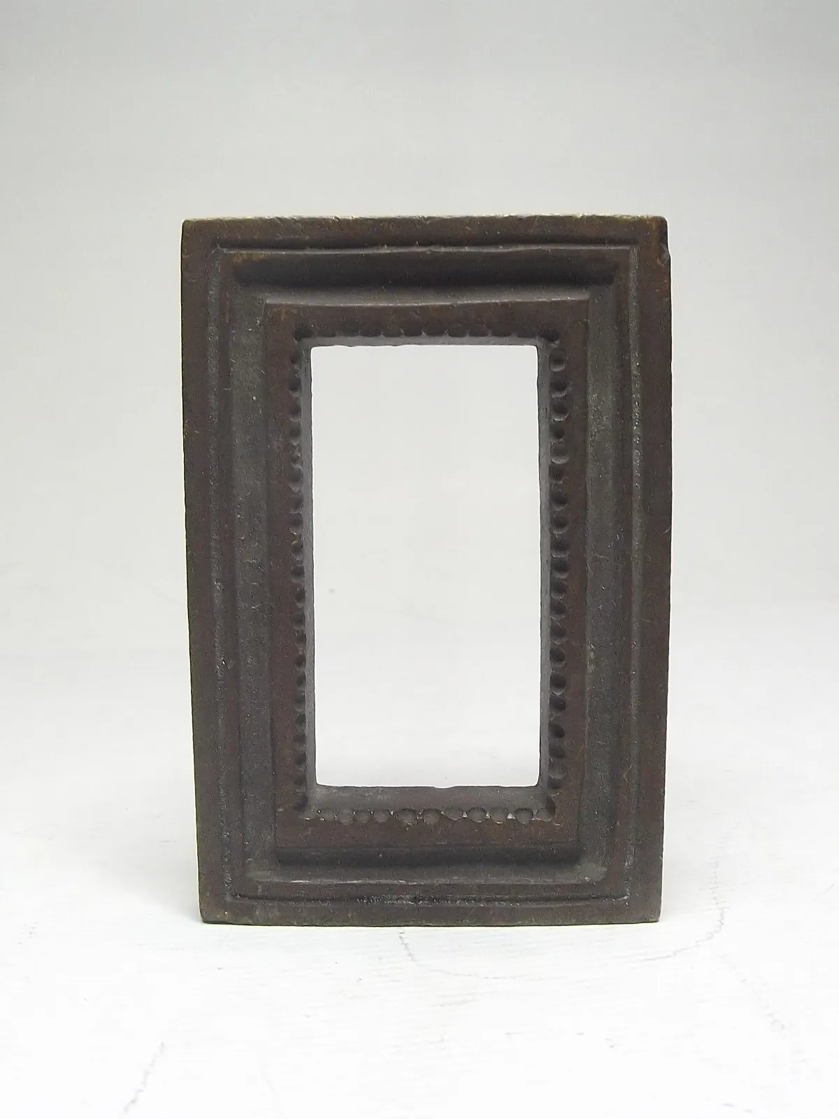 Sello de bronce