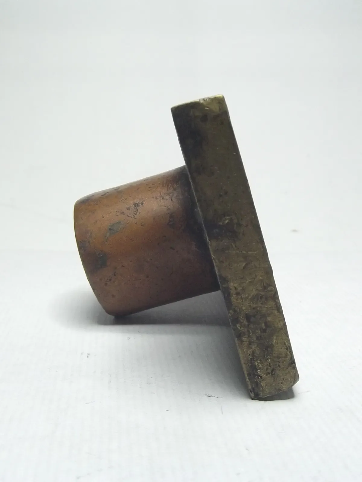 Sello de bronce