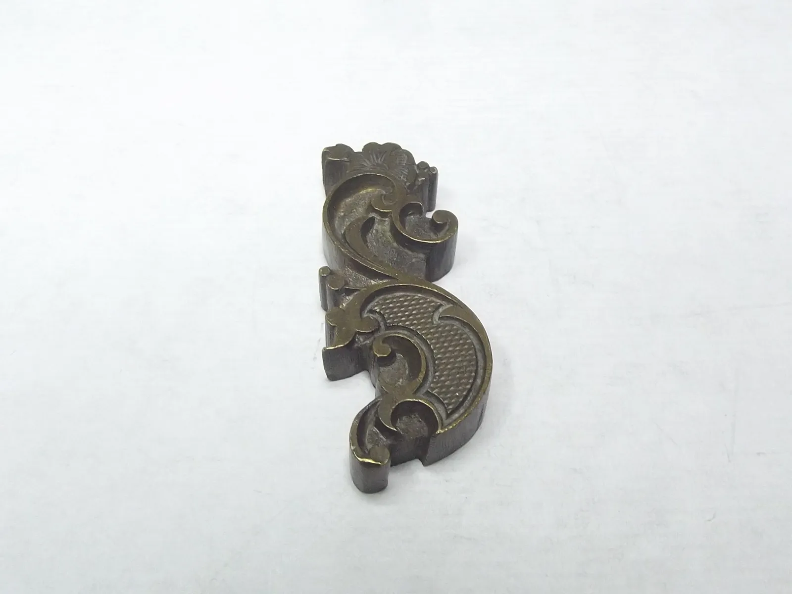 Sello de bronce