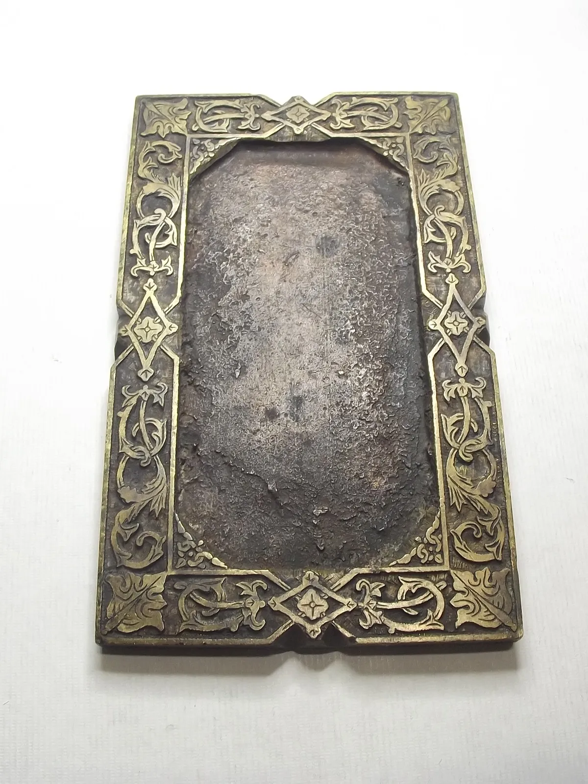 Grabado en bronce