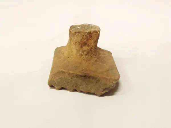Sello de barro cocido