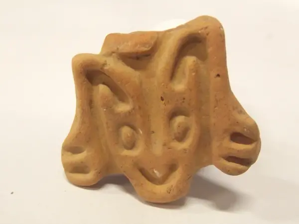 Sello de barro cocido