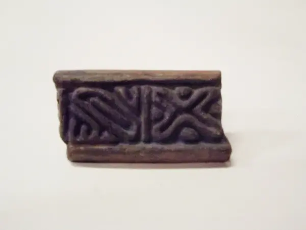 Sello de barro cocido