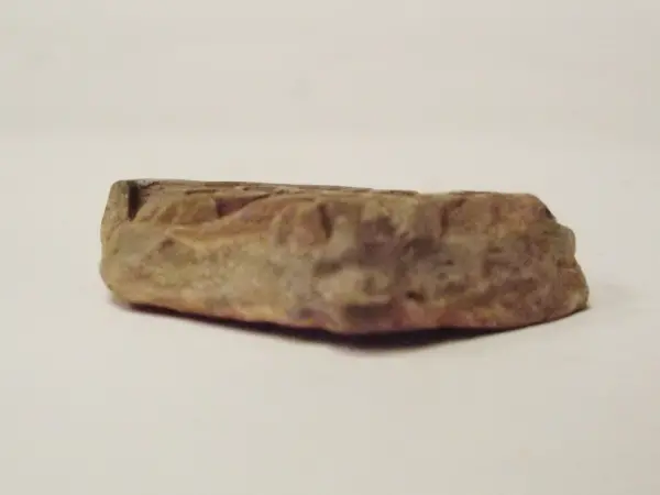 Sello de barro cocido