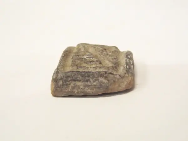 Sello de barro cocido