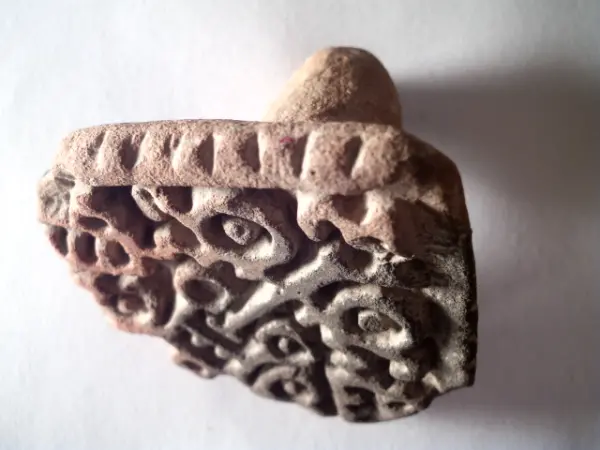 Sello de barro cocido