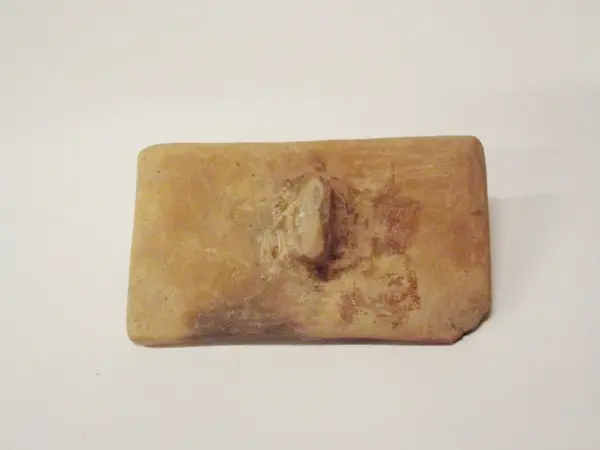 Sello de barro cocido