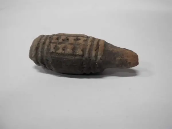 Sello de barro cocido