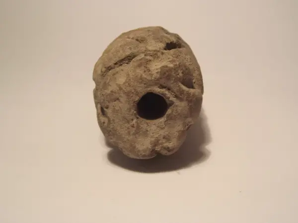 Sello de barro cocido
