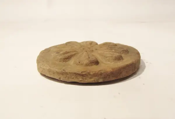 Sello de barro cocido