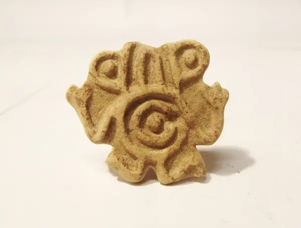 Sello de barro cocido