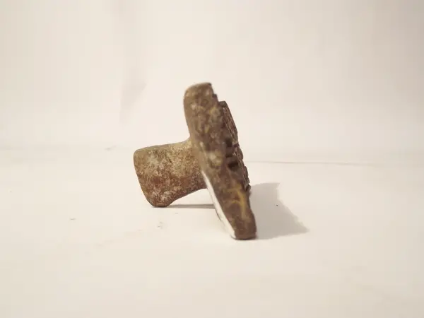 Sello de barro cocido