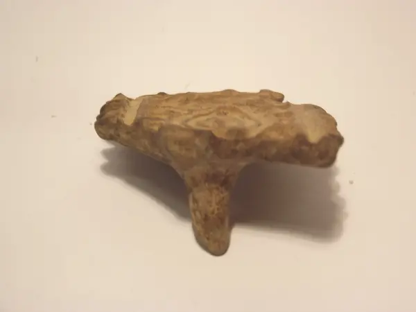 Sello de barro cocido