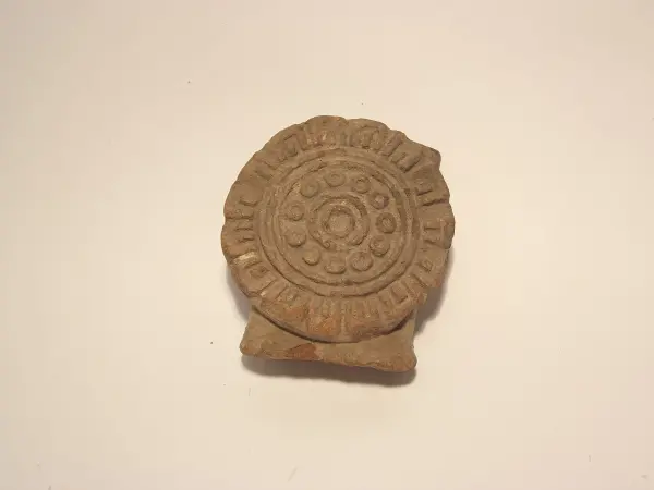 Sello de barro cocido