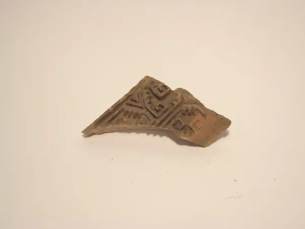 Sello de barro cocido