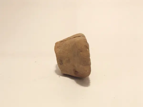 Sello de barro cocido