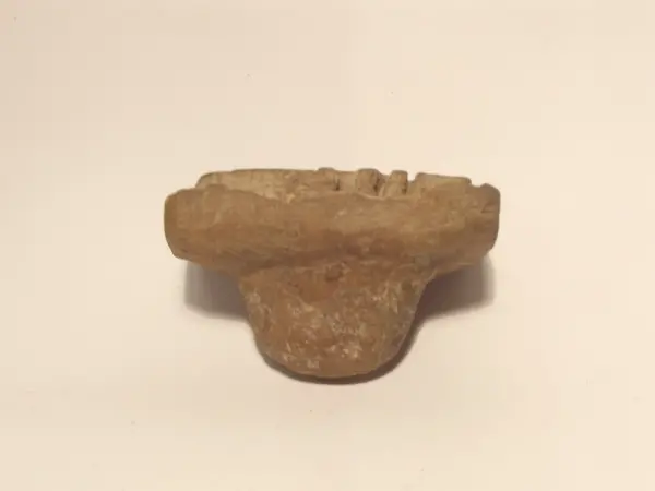 Sello de barro cocido