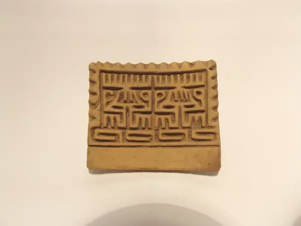 Sello de barro cocido