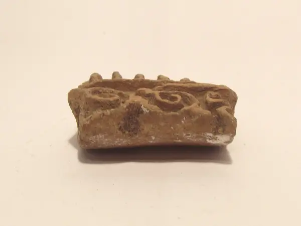 Sello de barro cocido