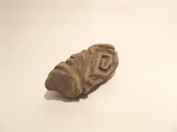 Sello de barro cocido