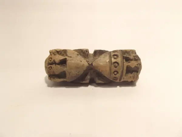 Sello de barro cocido