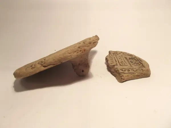 Sello de barro cocido